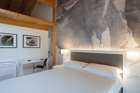 Superior Double Room, Private Bathroom | In-room safe, desk, laptop workspace, blackout drapes