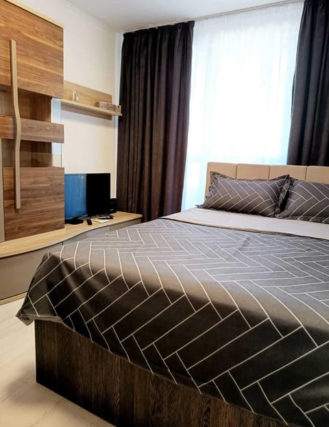 Blackout drapes, iron/ironing board, free WiFi, bed sheets