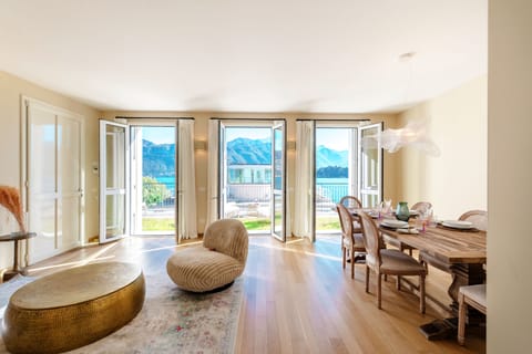 Apartment, Lake View | Living area | 30-inch TV with digital channels