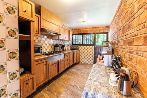 Villa, 3 Bedrooms, Garden View | Private kitchen | Full-size fridge, microwave, oven, stovetop