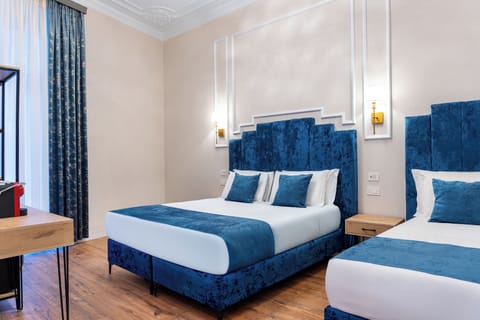Comfort Triple Room | Down comforters, memory foam beds, minibar, in-room safe