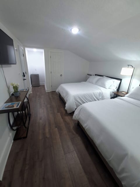 Room, 2 Double Beds, Non Smoking | Iron/ironing board, free WiFi