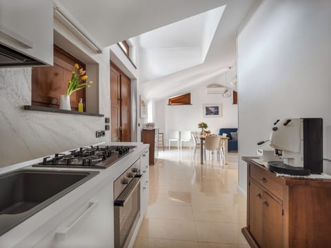 Comfort Apartment, City View | Private kitchen | Fridge, microwave, oven, stovetop