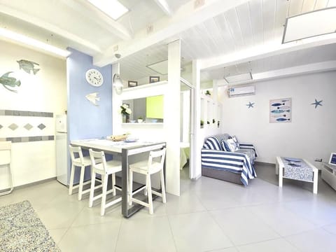 City Duplex, Partial Sea View | Living area | 40-inch Smart TV with digital channels