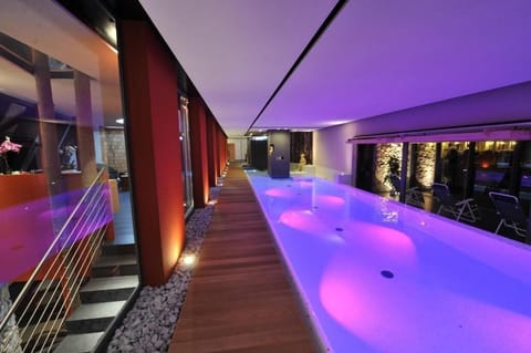 Indoor pool, open 7:00 AM to 9:00 PM, sun loungers