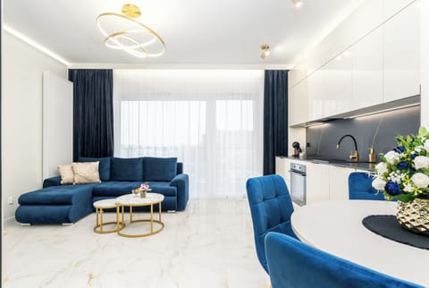 Classic Apartment, Balcony | Living area | Flat-screen TV