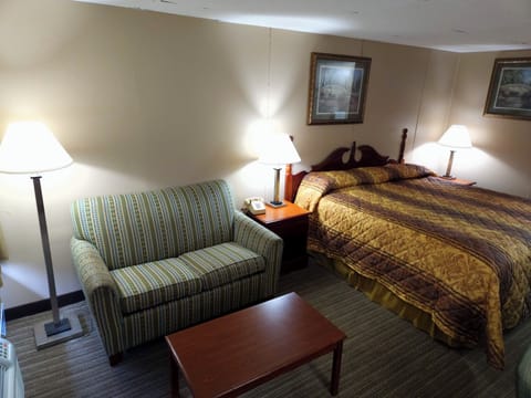 Room, 1 King Bed, Non Smoking | Iron/ironing board, rollaway beds, free WiFi, bed sheets