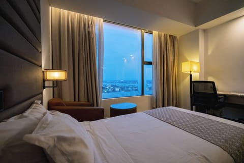 Premium bedding, down comforters, memory foam beds, minibar