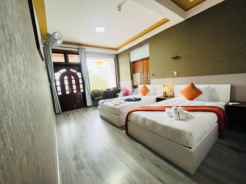 Deluxe Twin Room, Balcony | In-room safe, desk, laptop workspace, blackout drapes