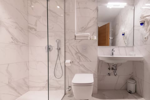 Deluxe Double or Twin Room, Balcony, Sea View | Bathroom | Shower, hair dryer, towels, soap