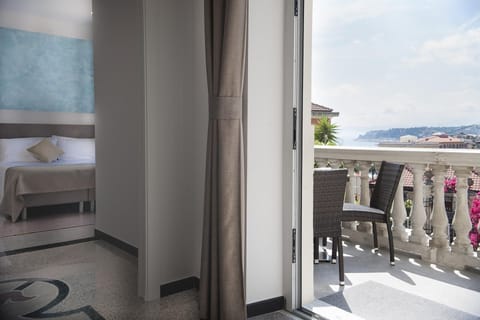 Apartment, Sea View | In-room safe, desk, bed sheets