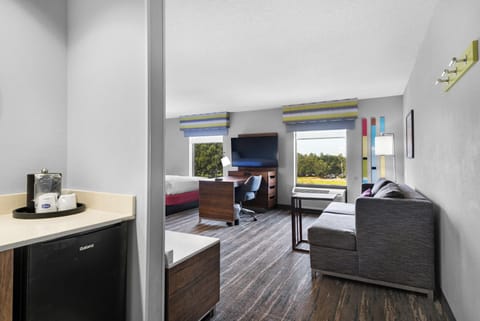 Desk, laptop workspace, blackout drapes, iron/ironing board