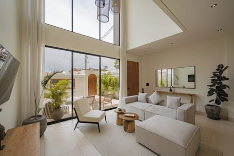Deluxe Villa, 2 Bedrooms, Patio, Pool View | Living room | 50-inch TV with cable channels