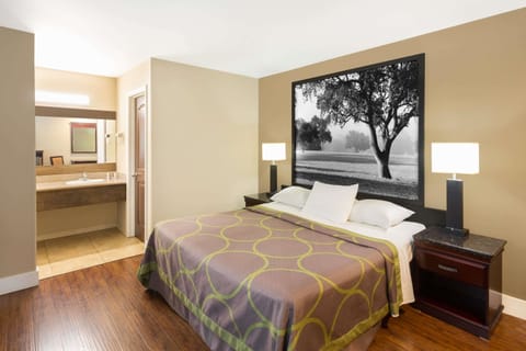 Desk, laptop workspace, iron/ironing board, cribs/infant beds