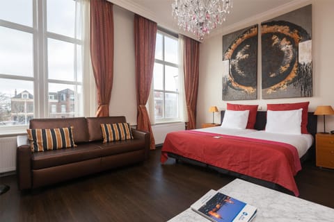 Family Room, 2 Twin Beds (with Sofabed) | In-room safe, desk, laptop workspace, iron/ironing board