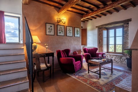 Deluxe Villa, Garden View | Living area | 32-inch flat-screen TV with satellite channels