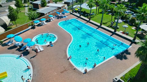 Seasonal outdoor pool, pool umbrellas, sun loungers