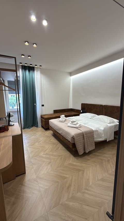 Luxury Quadruple Room, City View | In-room safe, iron/ironing board, free WiFi