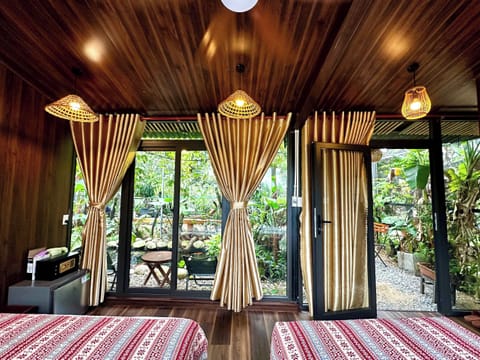 Deluxe Twin With Garden View | Minibar, WiFi (free), bed sheets