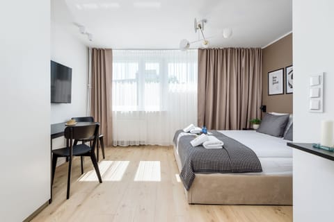 Comfort Studio Suite, City View | Desk, laptop workspace, blackout drapes, iron/ironing board