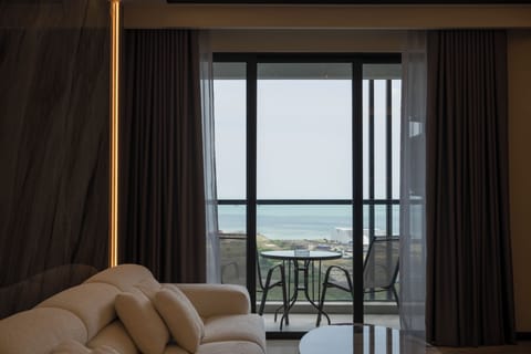 Presidential Suite, 1 King Bed, Partial Sea View | Balcony