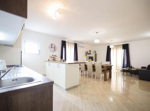 Villa (Three bedroom villa with pool) | Living room | 32-inch flat-screen TV with satellite channels