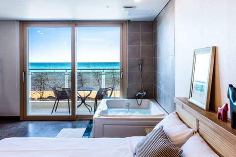 Couple Room or Emerald Room (Random Assign) | Down comforters, desk, free WiFi, bed sheets