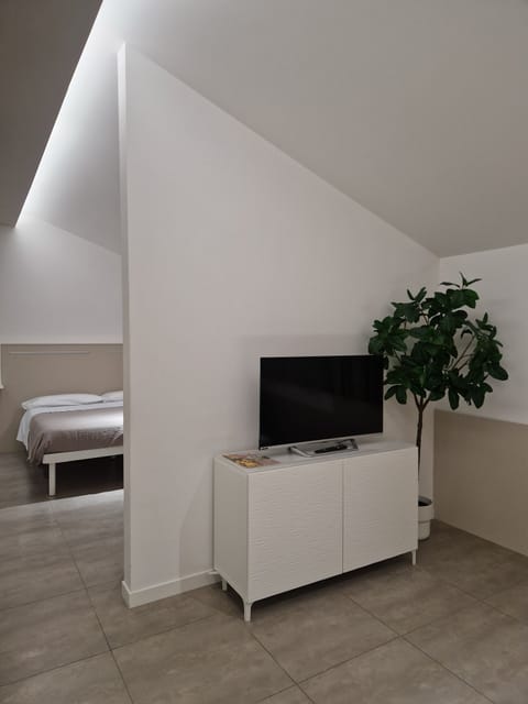 Comfort Apartment | Living area | TV