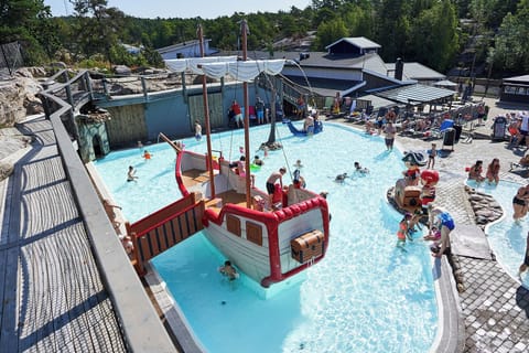 Seasonal outdoor pool, open 10:00 AM to 6:00 PM, sun loungers