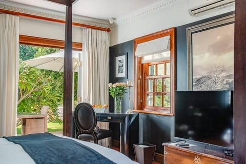 Deluxe Double Room, Pool View | In-room safe, iron/ironing board, free WiFi