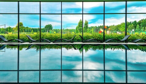 Indoor pool, seasonal outdoor pool, sun loungers, lifeguards on site