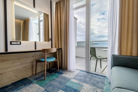 Deluxe Double or Twin Room, 1 Bedroom, Sea View | In-room safe, desk, laptop workspace, blackout drapes