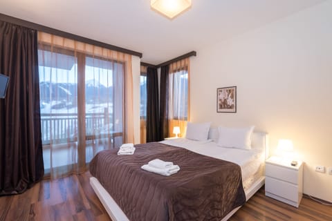 Apartment, 1 Bedroom (Free Mineral Pool, Saunas, Steam bath) | Minibar, desk, soundproofing, free cribs/infant beds