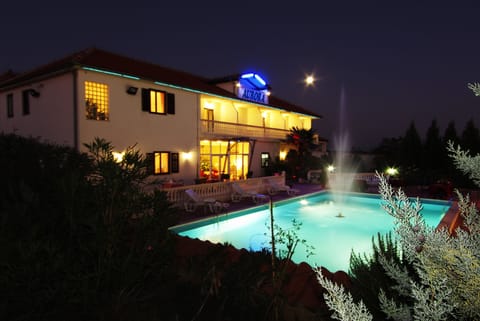 2 outdoor pools, open 8:00 AM to 8:00 PM, free cabanas, pool umbrellas