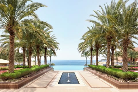 Outdoor pool, free cabanas, pool umbrellas