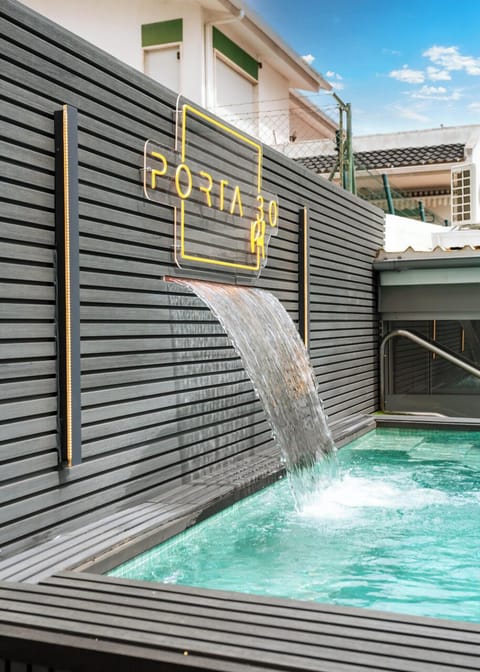 Outdoor pool, open 8:00 AM to 10:00 PM, pool umbrellas, sun loungers
