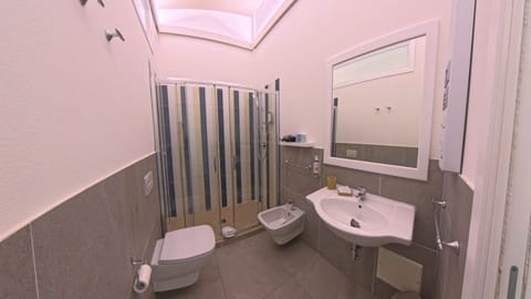 Classic Double or Twin Room | Bathroom | Hair dryer, towels, soap, shampoo