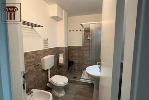 Shower, free toiletries, hair dryer, slippers