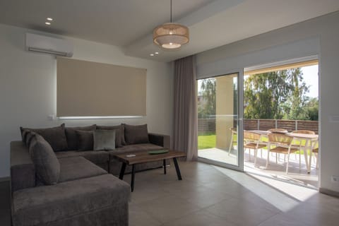 Deluxe Villa, Balcony, Courtyard View | Living area | Flat-screen TV