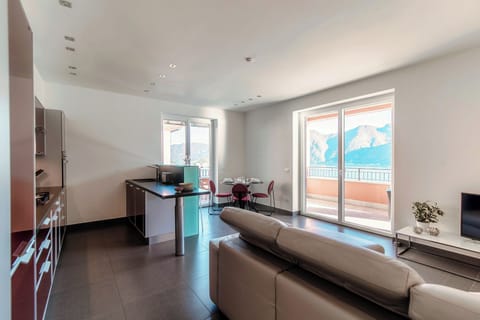 Apartment, Lake View | Living room | 30-inch TV with digital channels