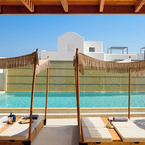 Outdoor pool, open 11:00 AM to 8:00 PM, pool umbrellas, sun loungers