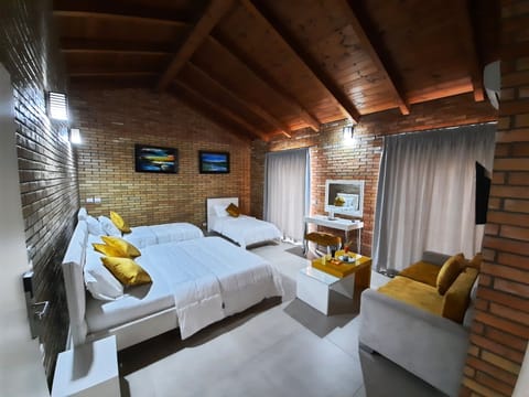 Deluxe Suite, Balcony | Desk, free WiFi