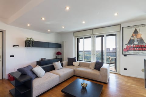Comfort Double Room, City View | Living area | 65-inch Smart TV with digital channels