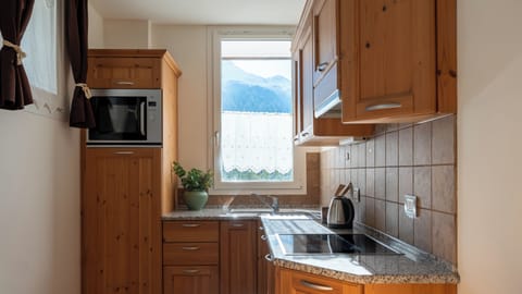 Apartment (1 Bedroom) | Private kitchen | Microwave, oven, electric kettle, highchair