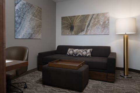 Premium bedding, desk, laptop workspace, iron/ironing board