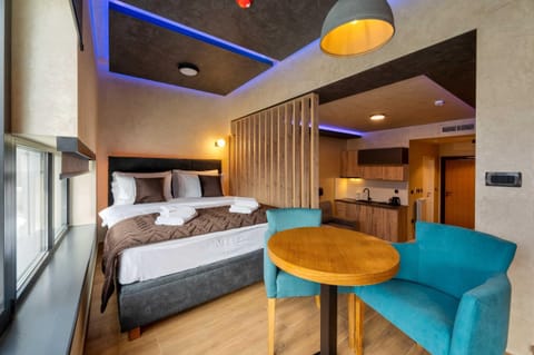 Deluxe Apartment, City View | In-room safe, desk, laptop workspace, soundproofing