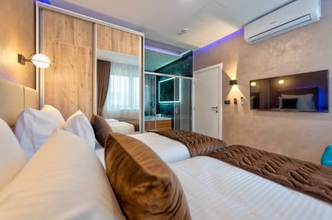 Deluxe Apartment, 2 Bedrooms, City View | In-room safe, desk, laptop workspace, soundproofing