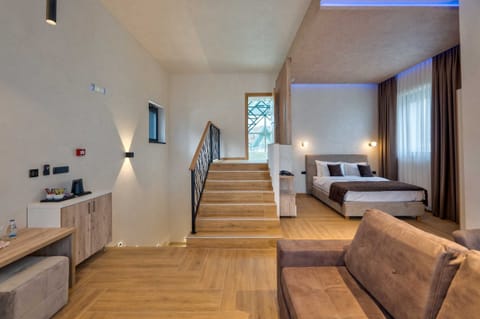 Superior Apartment, City View | In-room safe, desk, laptop workspace, soundproofing