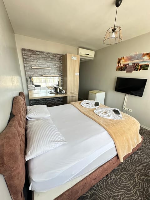 Basic Studio, City View | Premium bedding, in-room safe, laptop workspace, free WiFi