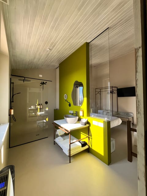 Shower, hair dryer, slippers, towels